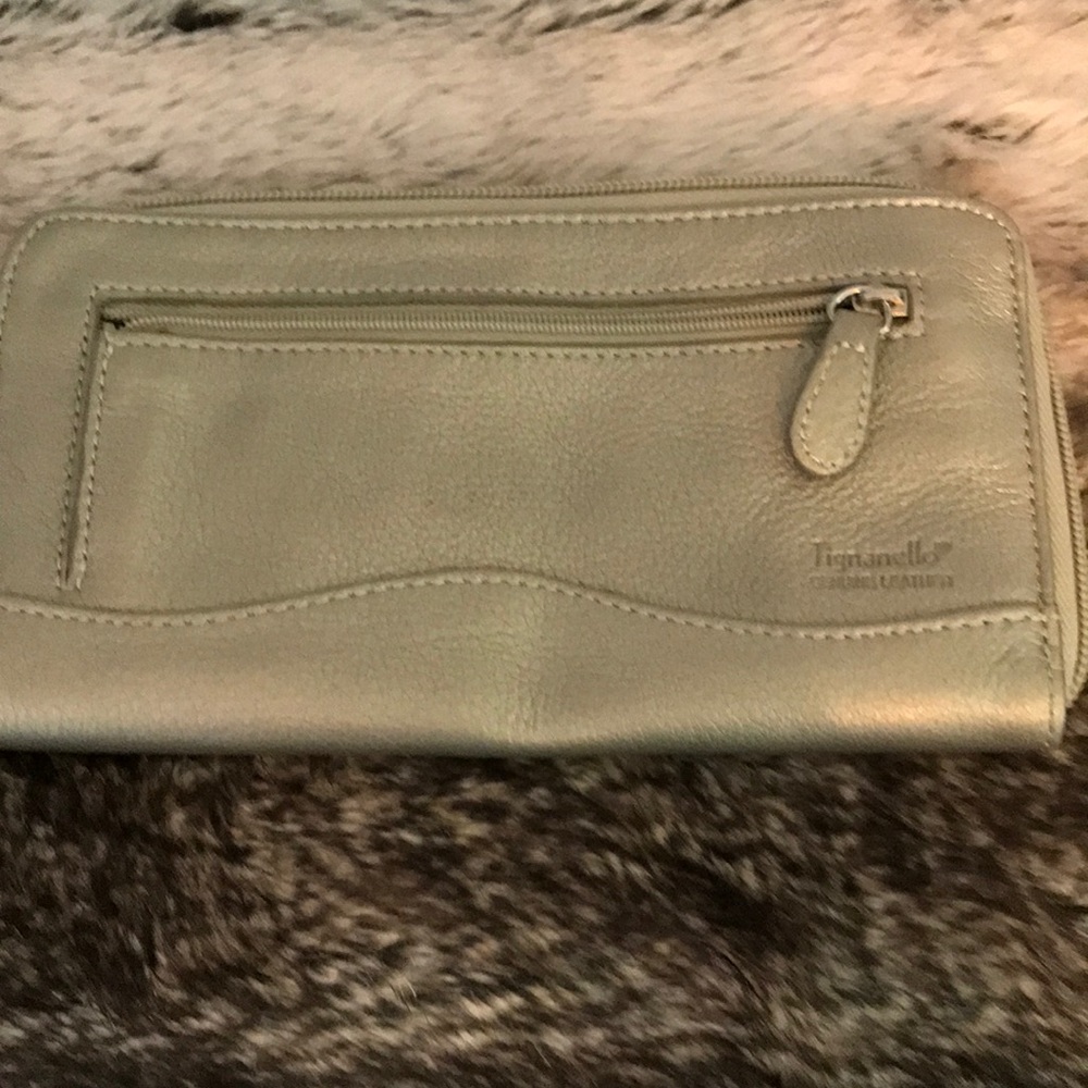 Leather wallet Tignanello.  silver . 8"x 3 1/2"